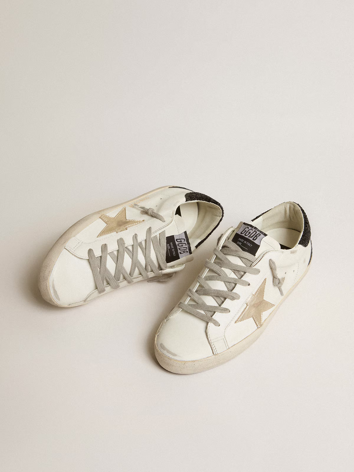 Golden Goose Super-Star Donna con stella oro e talloncino in glitter nero