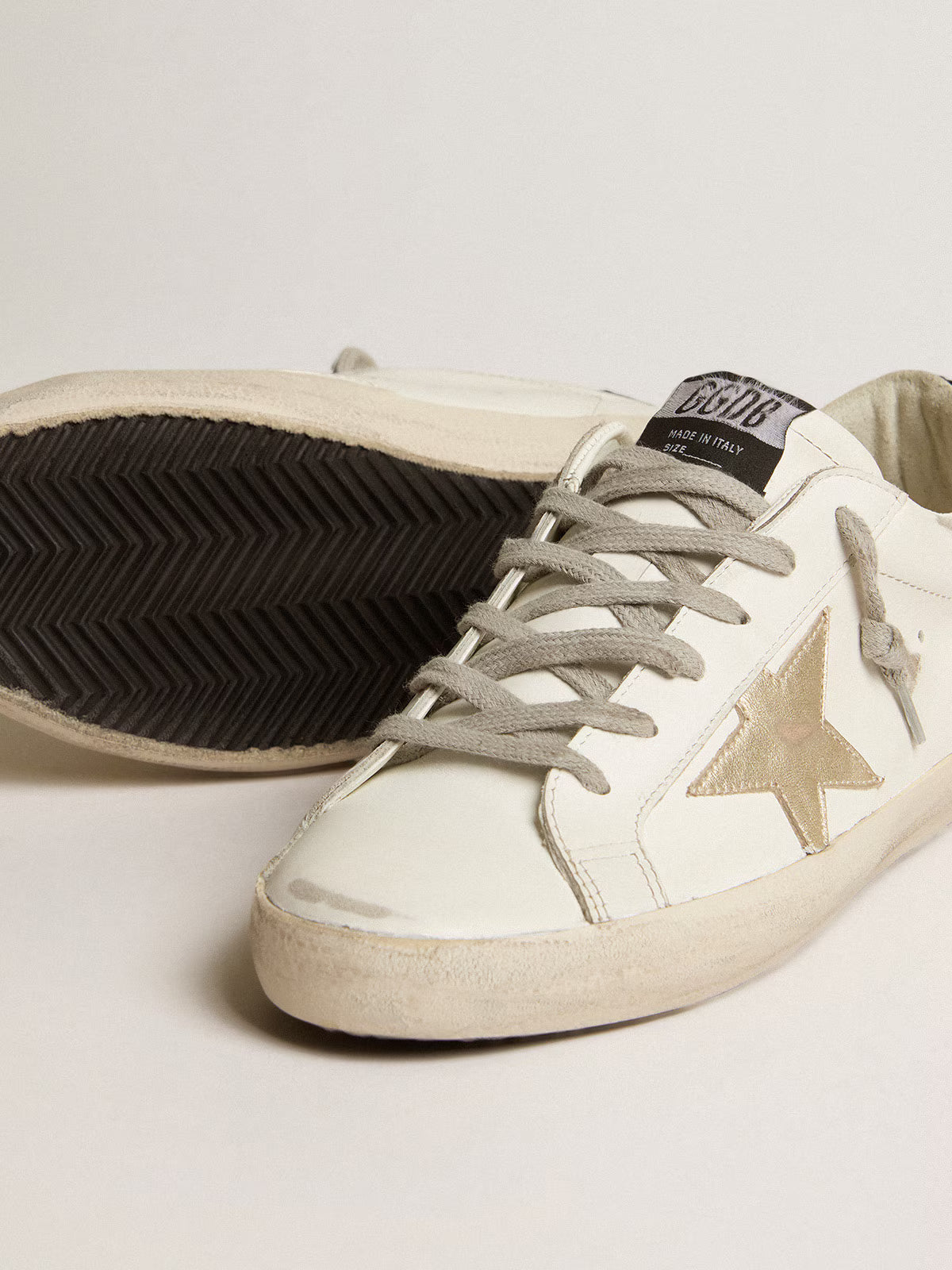 Golden Goose Super-Star Donna con stella oro e talloncino in glitter nero