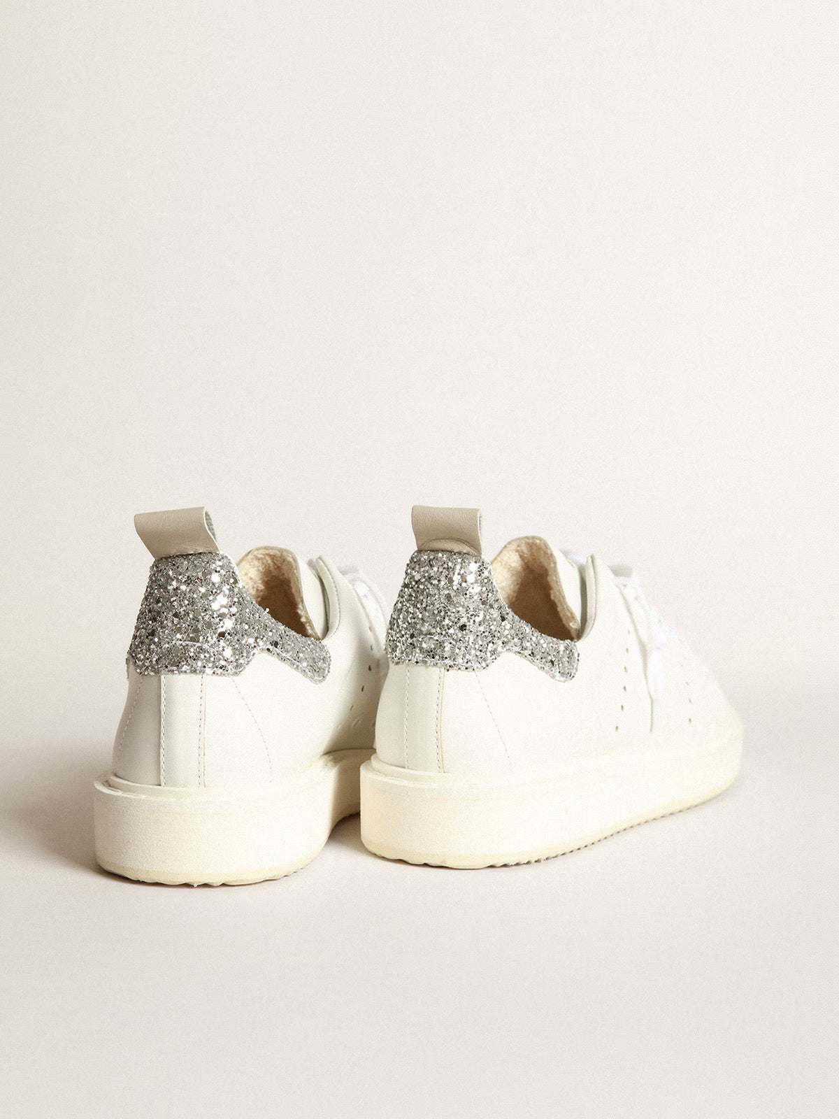 Starter donna in pelle bianca con talloncino glitter argento