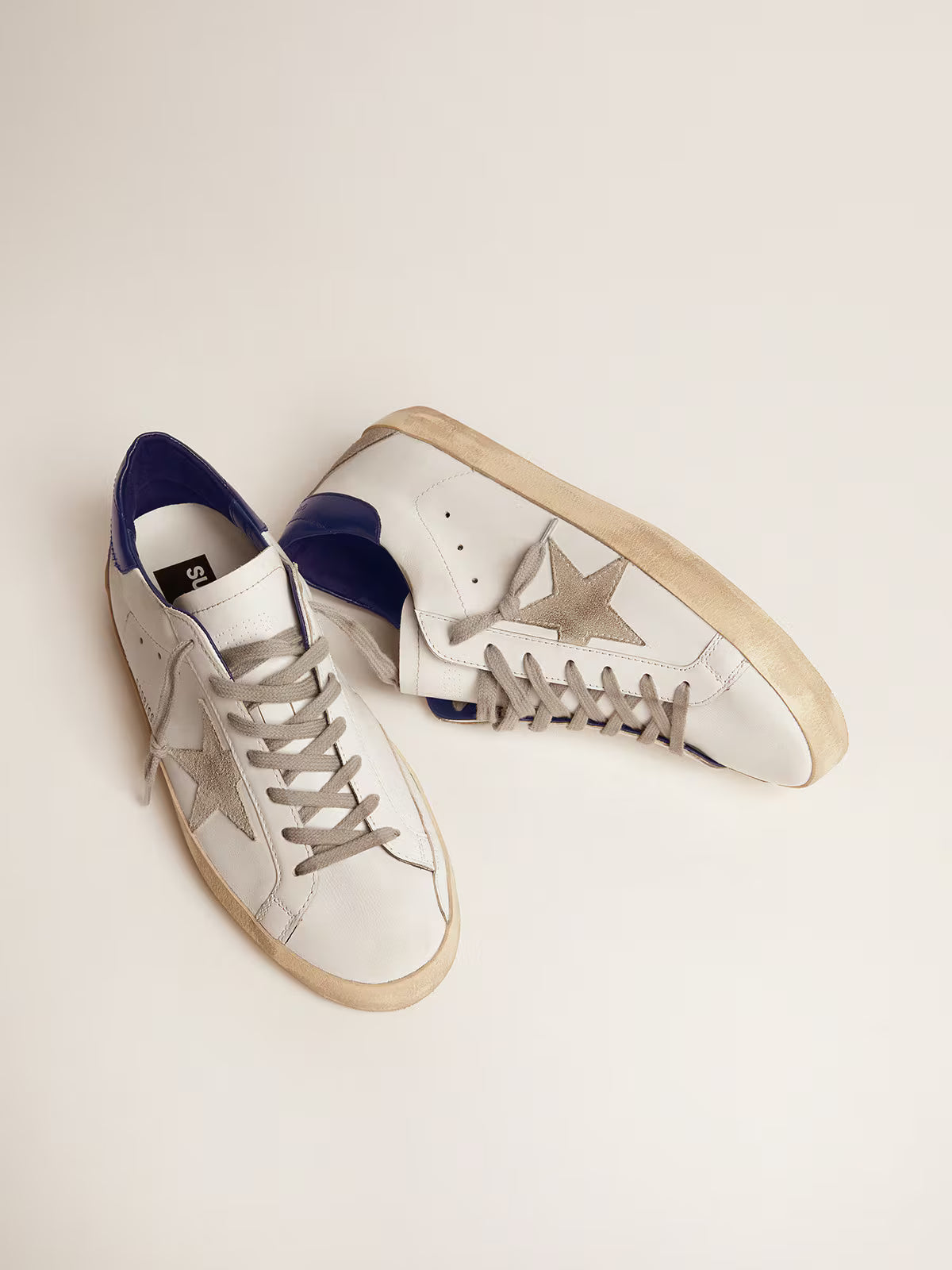 Golden Goose Super-Star Uomo con stella in suede e talloncino blu