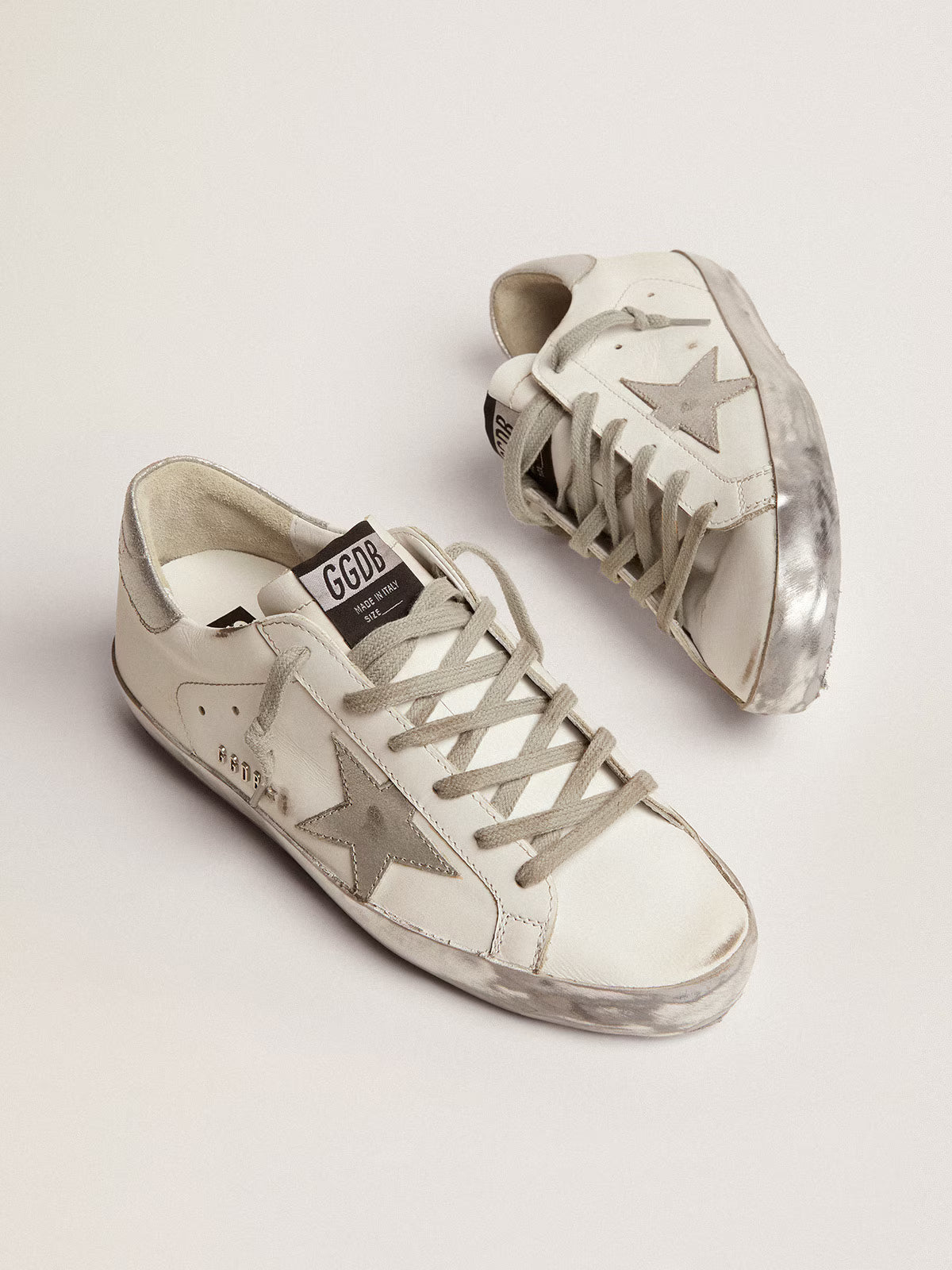 Golden Goose Super-Star in pelle con foxing sparkle argento e lettering metal studs