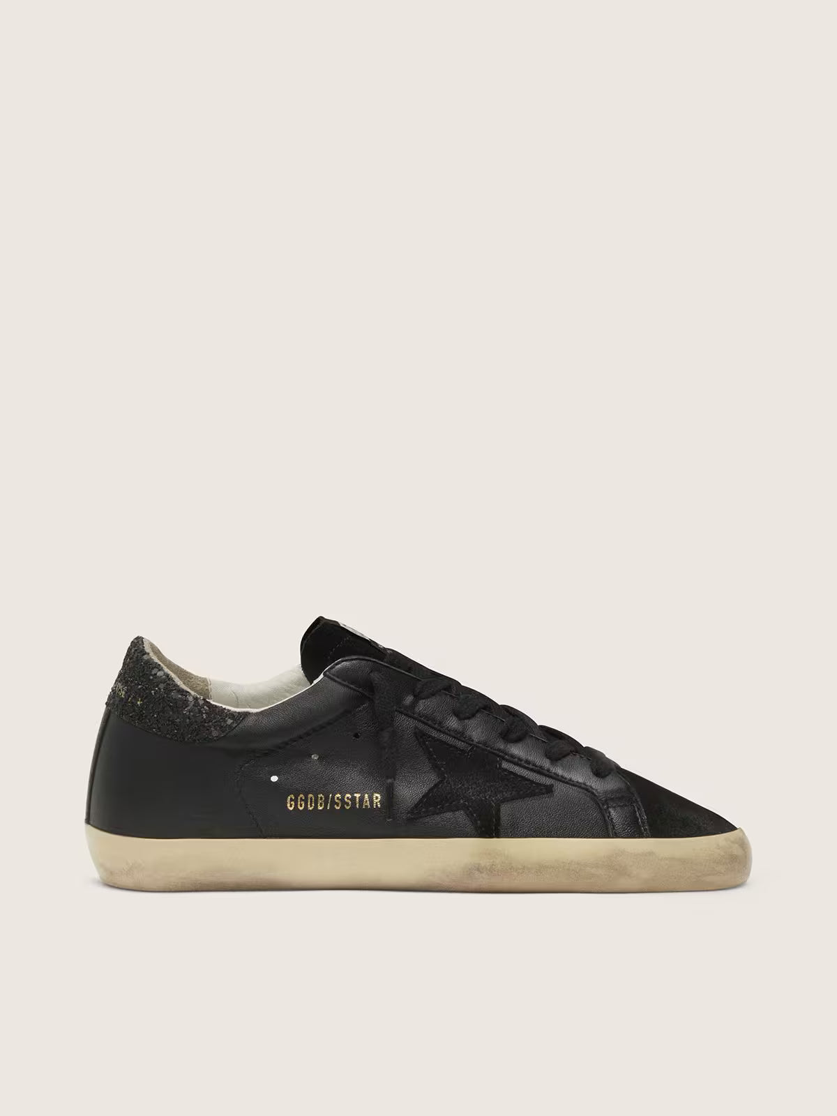 Golden Goose Super-Star Donna in nappa nera con stella in suede nero e talloncino in glitter neri