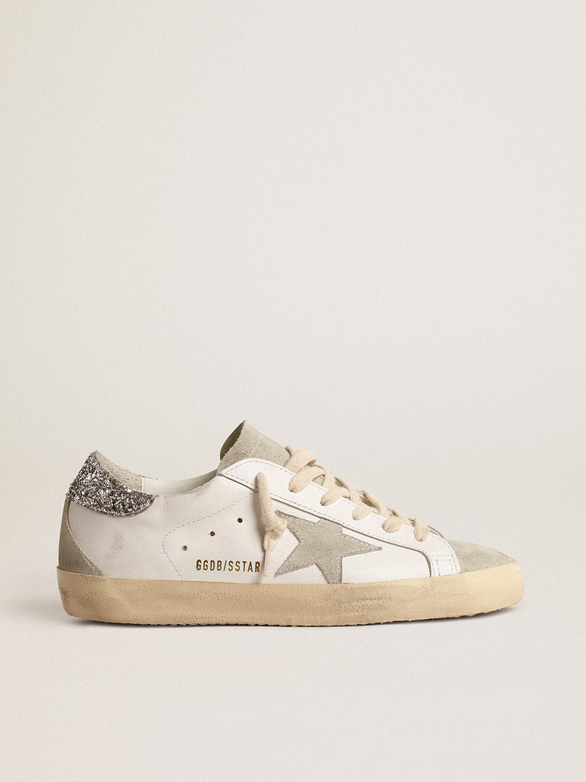 Golden Goose Super-Star Donna con stella grigia e talloncino in glitter argento