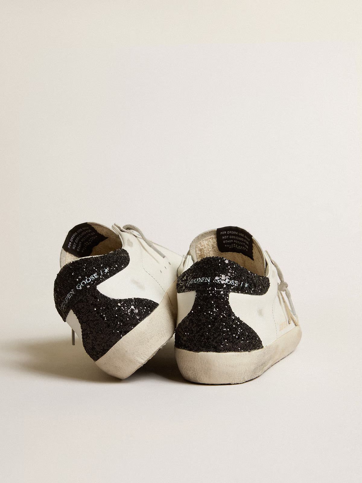 Golden Goose Super-Star Donna con stella oro e talloncino in glitter nero