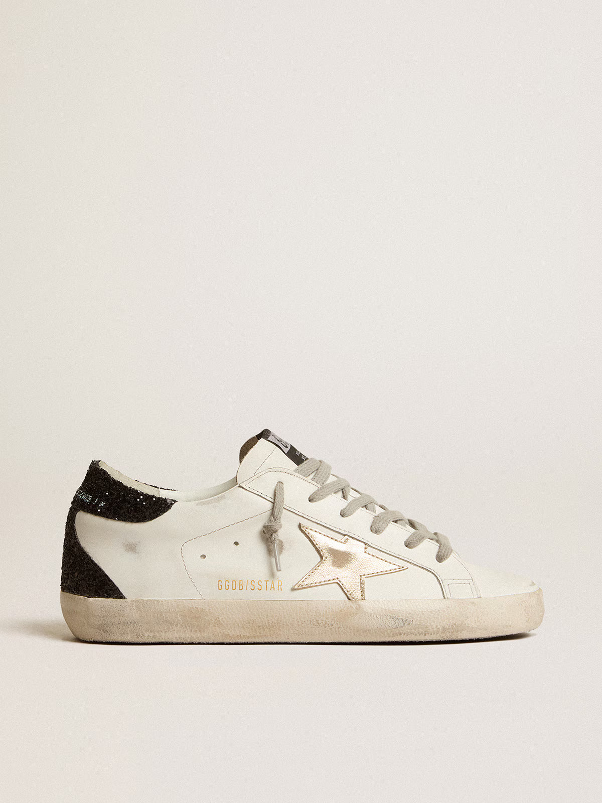 Golden Goose Super-Star Donna con stella oro e talloncino in glitter nero
