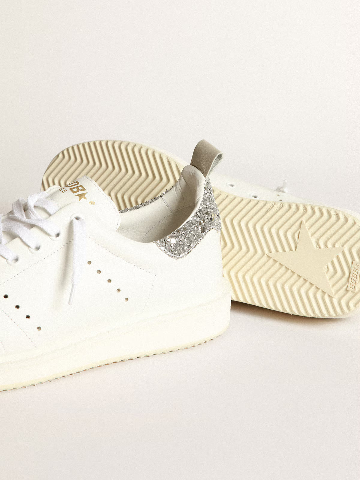 Starter donna in pelle bianca con talloncino glitter argento